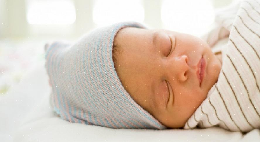 1-3 meses - É perfeitamente normal embalar seu filho para dormir